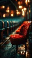Vintage red chair in an elegant setting with ambient lighting and blurred background creating a cozy atmosphere photo