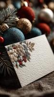 Beautifully crafted holiday greeting card displayed among festive decorations in a cozy setting photo