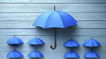 Six blue umbrellas are arranged in a row photo