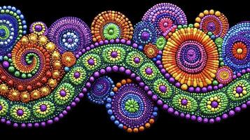A colorful pattern of beads on a black background photo