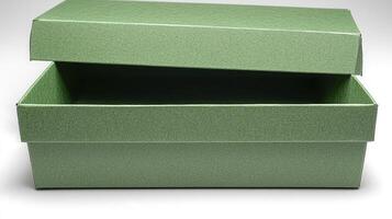 Green box with lid on white background photo