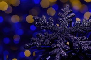 Festive snowflake ornament, bokeh background photo