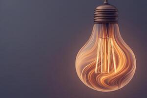 A decorative light bulb featuring an elegant swirling pattern emits a warm, inviting glow, set against a muted grey background. The stylish design adds a touch of sophistication to any space. photo