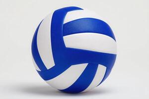 A vibrant volleyball designed with bold blue and white stripes is centered on a plain, light background. Its details highlight the texture and craftsmanship, perfect for the sport. photo
