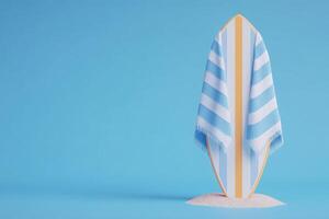 A vibrant surfboard stands upright, covered with a striped towel, against a clear blue backdrop. The scene evokes a relaxed beach atmosphere, inviting thoughts of summer surf sessions. photo