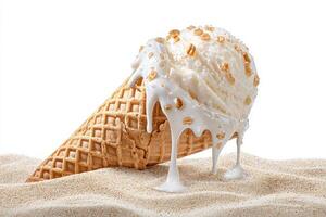 An ice cream cone topples over on a sandy beach, causing the creamy scoop to melt and drip. The white ice cream is adorned with crunchy toppings, creating a delightful mess. photo