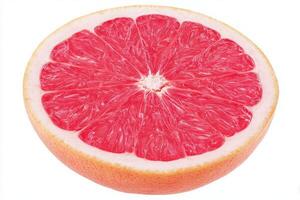 A perfectly sliced grapefruit reveals its bright pink flesh and juicy texture. The fruit is placed on a clean, white background, emphasizing its freshness and natural appeal. photo