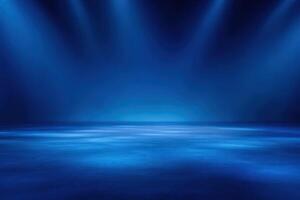 A spacious stage area is brightly lit with vibrant blue spotlights from above, creating a dramatic atmosphere perfect for performances or events. The smooth floor enhances visibility. photo