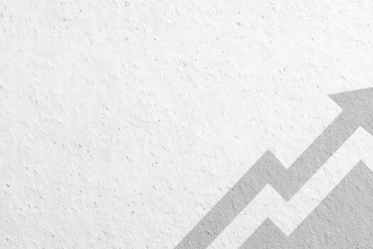 A smooth, textured surface features a light gray arrow pointing upwards, symbolizing growth and progress. The backgrounds soft lighting enhances the graphics positive message, evoking optimism. photo