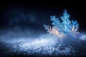A delicate snowflake rests on a layer of glistening snow, illuminated by soft blue light. The tranquil scene highlights the intricate patterns of the snowflake against a dark backdrop. photo