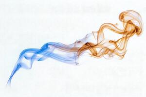 Wisps of blue and orange smoke elegantly intertwine and dance against a white background, creating an abstract and mesmerizing visual effect that captivates the viewer. photo