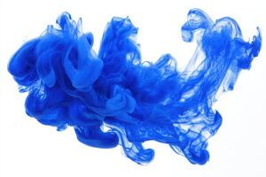 A vibrant swirl of blue ink disperses in water, creating striking abstract patterns. The fluid motion showcases the beauty of color blending, emphasizing the elegance of liquid dynamics. photo