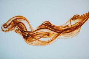 Brown lines intertwine gracefully, forming fluid shapes against a light backdrop. The movement suggests energy and creativity, evoking a sense of grace and elegance in design. photo