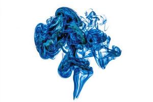A striking display of blue liquid forms intricate swirls and shapes against a plain white backdrop. The fluid dynamics create a captivating visual with depth and movement. photo
