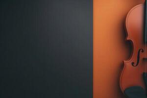 A violin is prominently displayed against a split background of deep gray and vibrant orange, emphasizing its curves and fine craftsmanship. The setting creates a striking visual contrast. photo