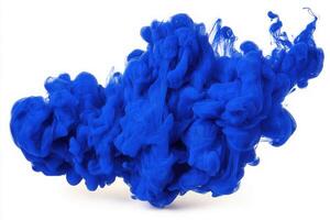 Vivid blue ink disperses in water, forming captivating shapes and textures. The fluid movement showcases a mesmerizing blend of colors, engaging viewers with its dynamic display of artistry. photo