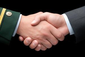 Two hands are shaking in a formal environment, symbolizing a partnership and mutual agreement. The person on the left is wearing a military uniform while the one on the right is in a suit. photo