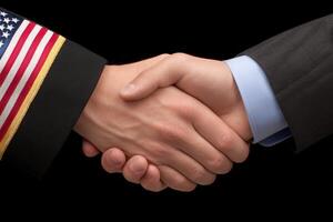 Two hands engage in a handshake, symbolizing a partnership between military service and business, reflecting mutual respect and cooperation. The setting suggests professionalism and unity. photo