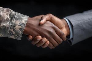 Two hands shake firmly, symbolizing unity and cooperation. One hand belongs to a soldier in military uniform, while the other belongs to a civilian in formal attire. photo
