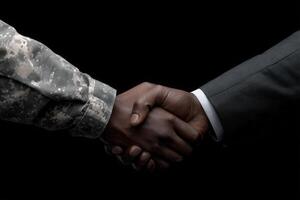 A close-up view of two hands shaking, one wearing a military uniform and the other in a formal suit. This gesture illustrates the connection between the armed forces and civilian life. photo