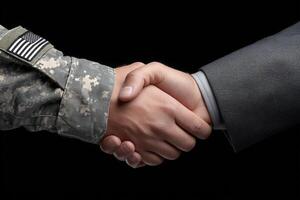 A soldier in camouflage uniform shakes hands with a civilian in a gray suit, representing collaboration and mutual respect. The dark background emphasizes the connection between them. photo