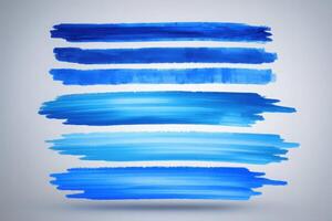 Various shades of blue paint are arranged in horizontal strokes on a light background, demonstrating artistic brushwork. The composition highlights texture and color flow, drawing the viewers eye. photo