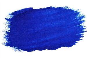 A bold stroke of blue paint demonstrates a rich hue and smooth texture against a stark white background. The vibrant color stands out, inviting viewers to explore its depth and artistry. photo