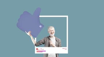 A smiling influencer conveys positivity by giving a thumbs up while standing against a solid background. The setting emphasizes social media engagement, reflecting enthusiasm for content creation. photo
