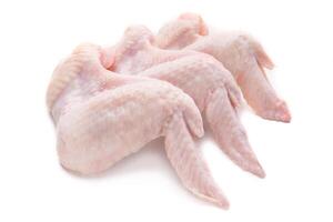 Three fresh chicken legs isolated on white background photo