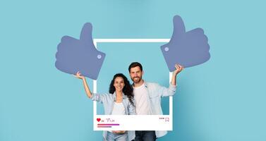 Two enthusiastic influencers express positivity with thumbs up gestures in a vibrant setting. They radiate energy while promoting digital engagement through their content creation. photo