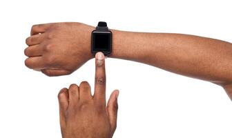 Smart watch at black male hand, white background cutout. Smartwatch - modern digital gadget with empty display, copy space photo