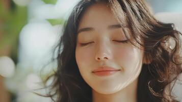 Close-up portrait of a serene young woman with soft, flowing hair. photo