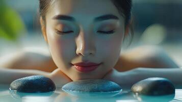 Relaxed woman enjoying spa treatment with smooth skin. photo