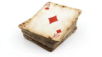 A vintage, aged deck of playing cards, stacked high. photo