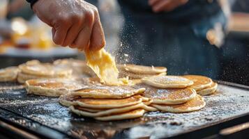 Closeup view of freshly cooked pancakes being served. photo