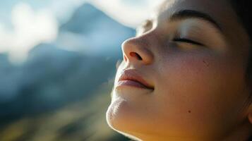 Close-up portrait of a serene person breathing deeply outdoors. photo