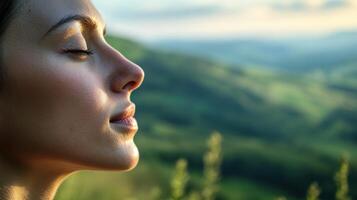 Close-up profile view of a serene woman in nature. photo