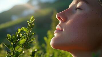 Close-up profile view of a person breathing deeply outdoors. photo