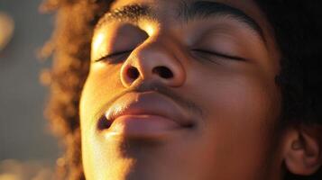Close-up of a young person's peaceful countenance. photo