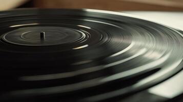 Close-up view of a spinning vinyl record player. photo