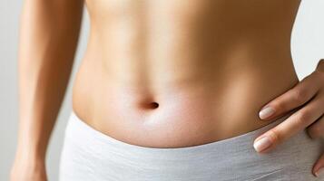 A woman's stomach with a large area of fat photo