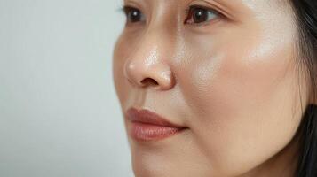 Close-up profile view of a person's face with glowing skin. photo