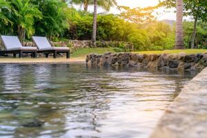 Serene Pool Oasis with Tropical Garden Ambiance photo