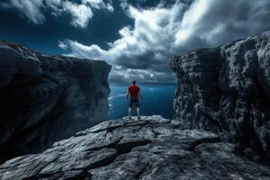 Awe Inspiring Cliffside View of the Ocean Under a Dramatic Sky photo