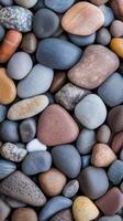 A Captivating Collection of Smooth Stones, A Natural Masterpiece of Colors and Textures. photo