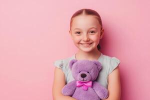 Smiling Girl with a Teddy Bear Adorable Childhood Portrait photo