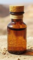 Ancient Amber Glass Bottle in the Desert Sunlight. A captivating vintage bottle, aged by the desert sun, resting on warm sand. A glimpse into a forgotten era. photo