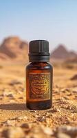 Golden Desert Elixir Exquisite Brown Bottle with Intricate Arabic Label on Sandy Landscape photo