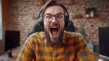 A Man Expressing Excitement During an Online Gaming Session photo