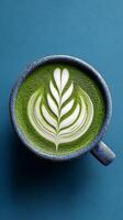 A Delicate Matcha Latte Art, Showcasing a Whimsical Leaf Design, Perfect for a Relaxing Moment photo